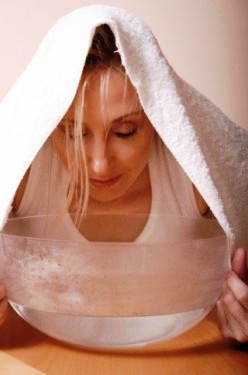 Steam your face to unclog then apply ice packs to shrink the pores.