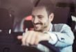 man in new car