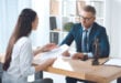 Worker's compensation lawyer having a meeting about claim withe his client